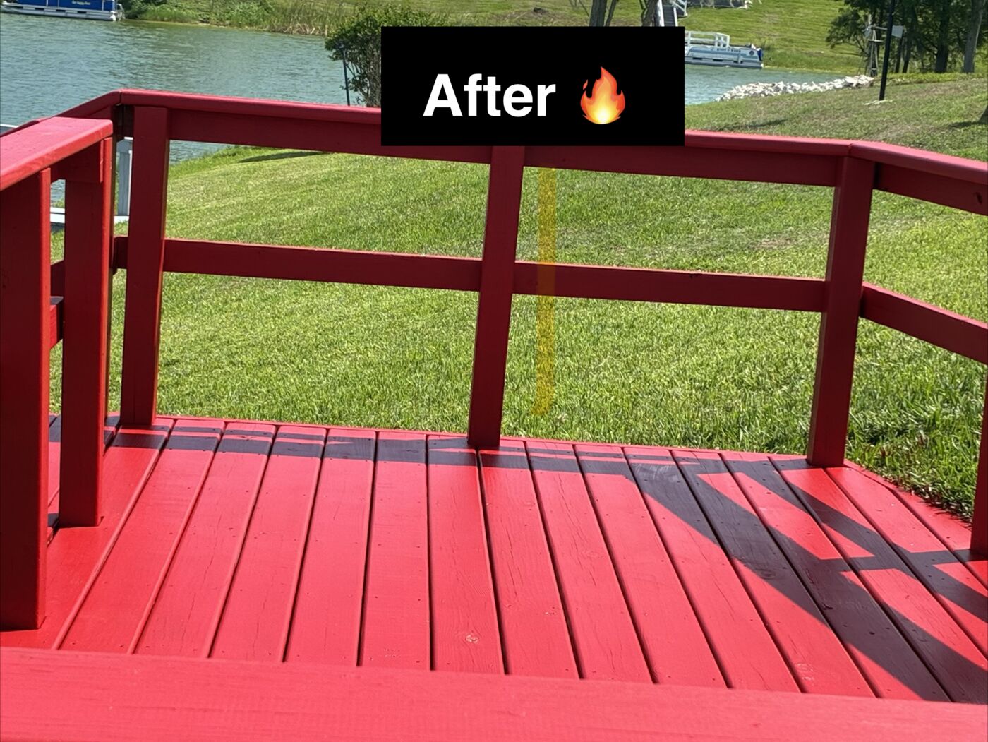 Lakeside deck after new boards and fresh red paint
